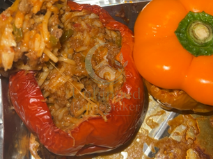 Bell peppers stuffed with rice and ground meat saucy mixture