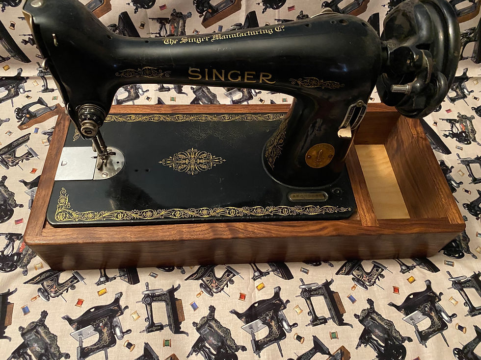 Thumbnail: Sewing machine base with accessory storage