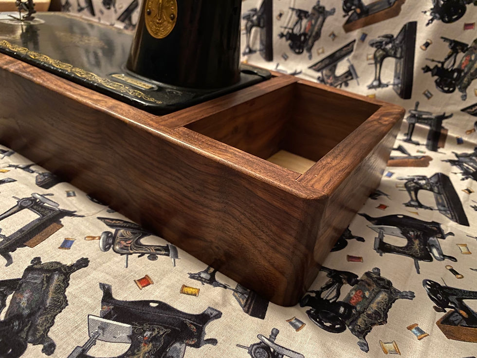 Thumbnail: Sewing machine base with accessory storage