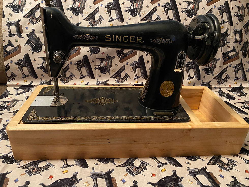 Thumbnail: Sewing machine base with accessory storage