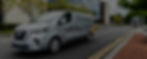 Silver B-Engineering van driving on city street