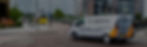 B-Engineering van driving near ta bus by a roundabout in Manchester