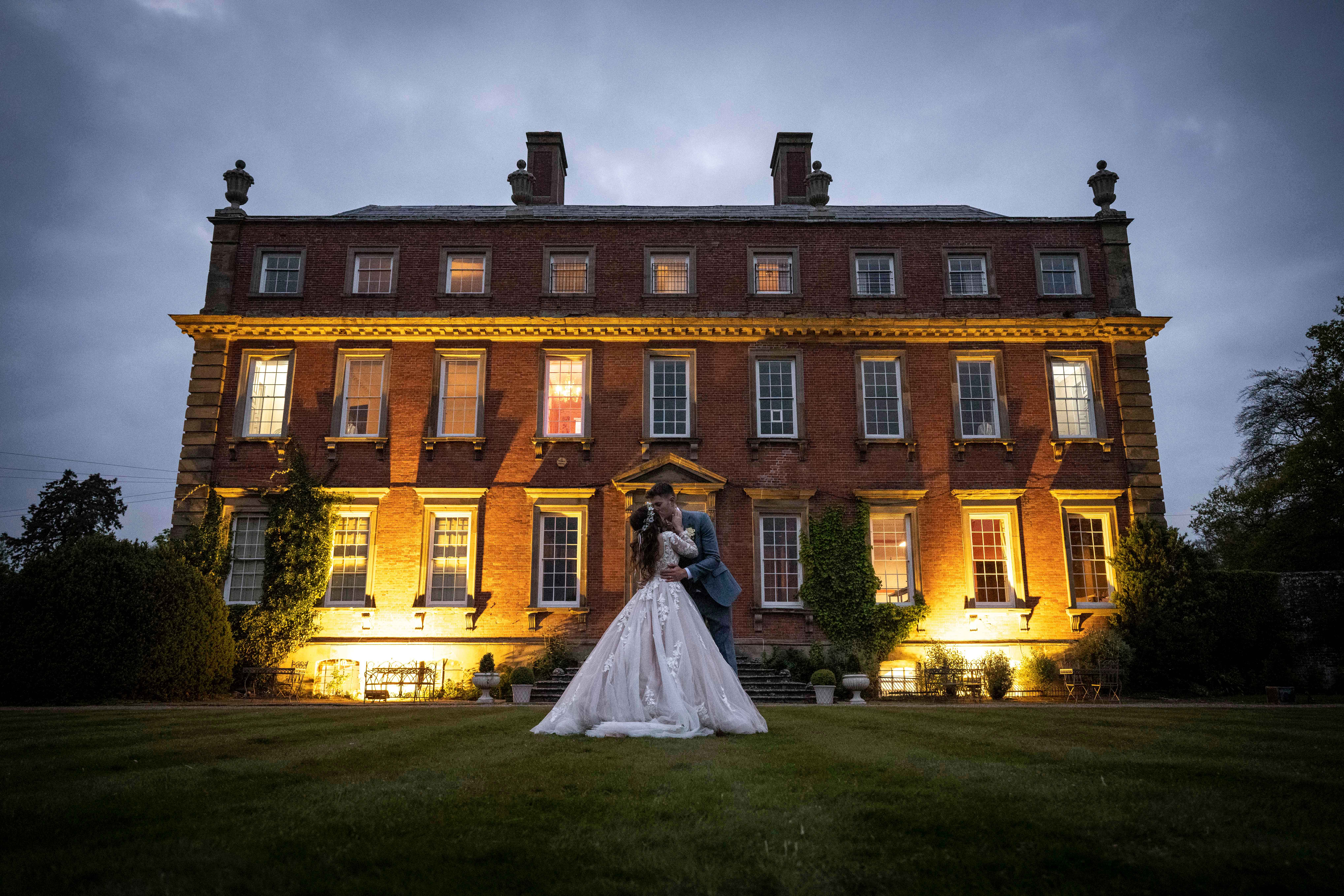 Wedding photographer documenting a full wedding day from preparations through the evening reception