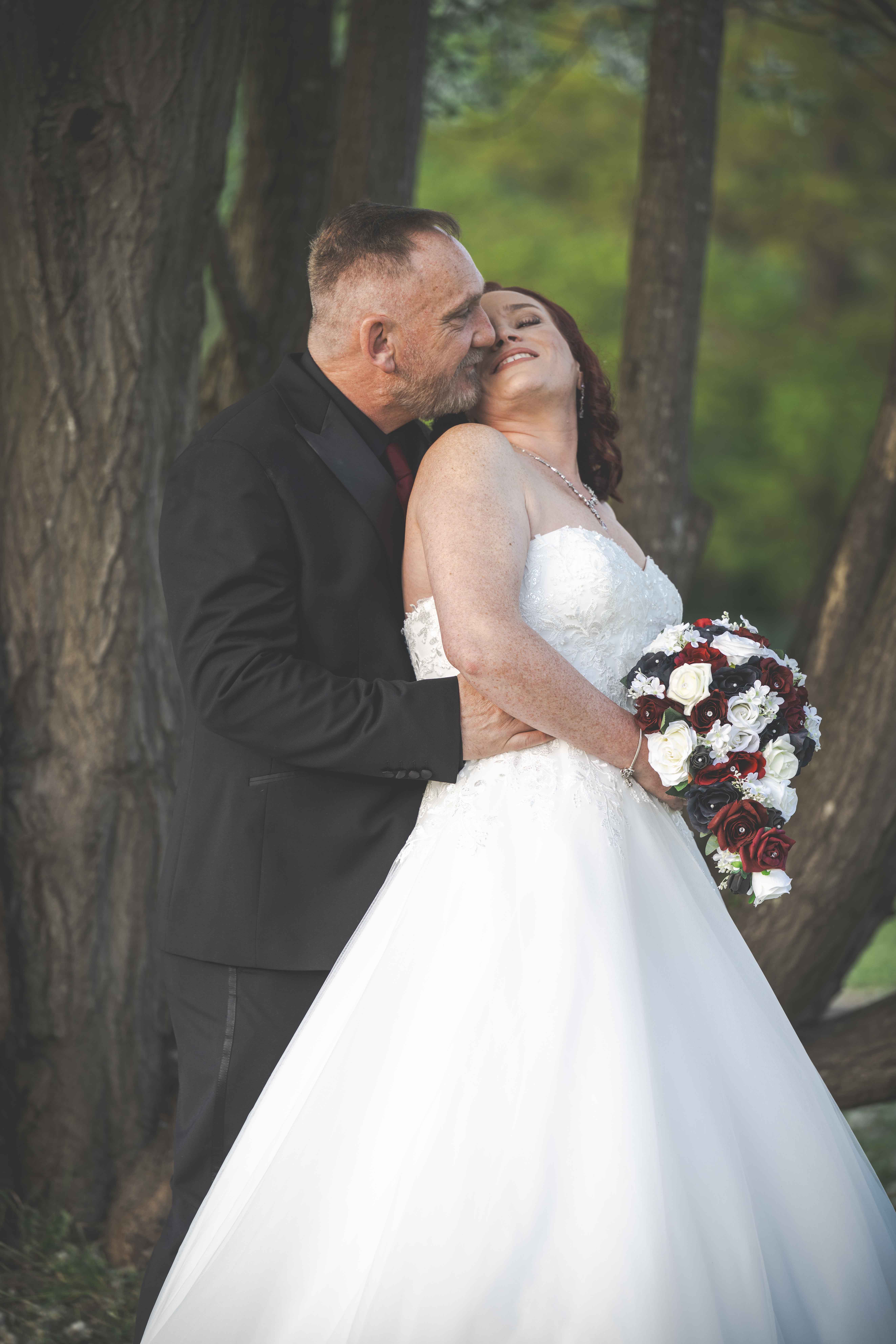 Wedding couple comparing photography-only and combined photography and videography package options
