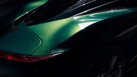 Green sports car rear view