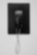 black telephone on white wall_edited.jpg