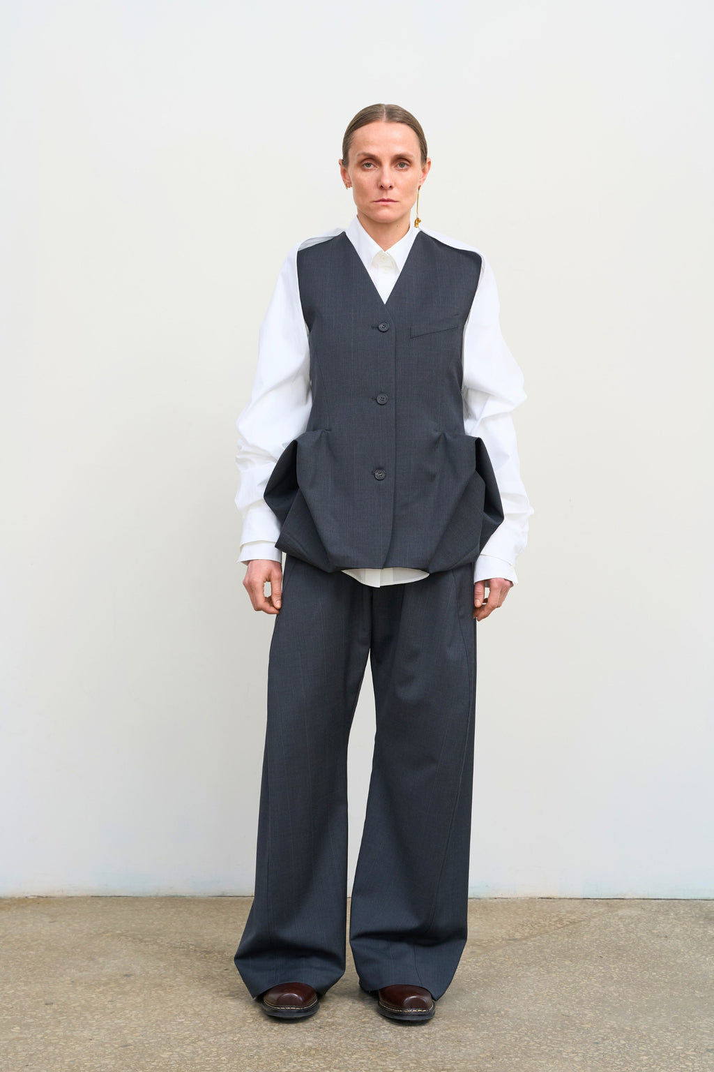 TAILORED VEST WITH FLORAL ACCENTS