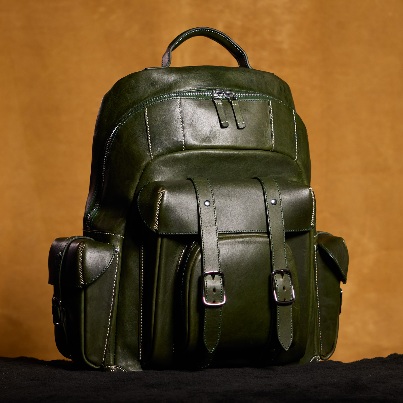 Hunter-Green backpack — full rear view showing the padded back panel