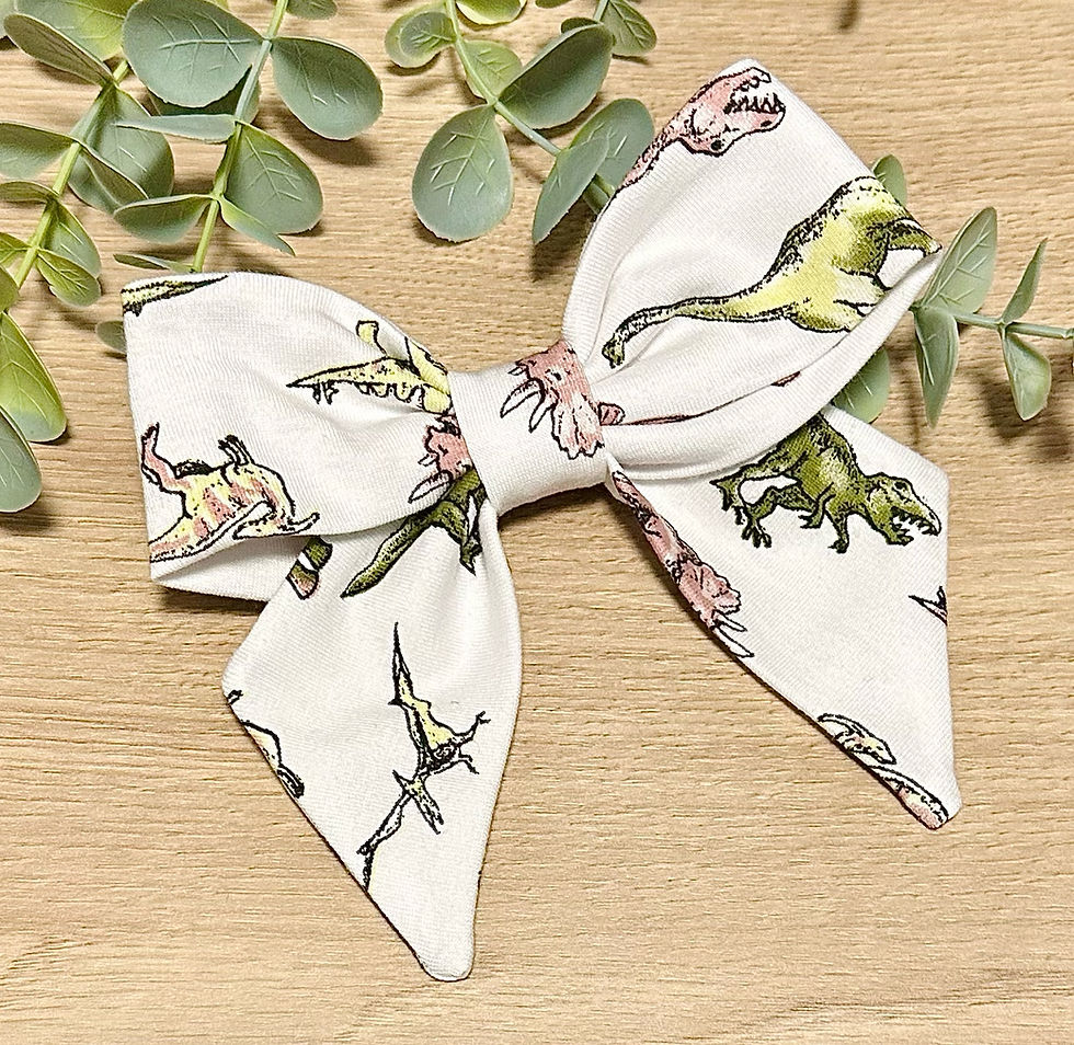 Thumbnail: White Dinosaur Holly Bow