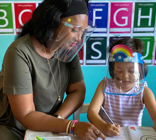 Child and teacher