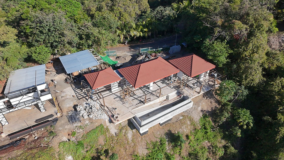 Three construction workers in safety vests and helmets look confused, with question marks above them. One points ahead. Gray wall background.