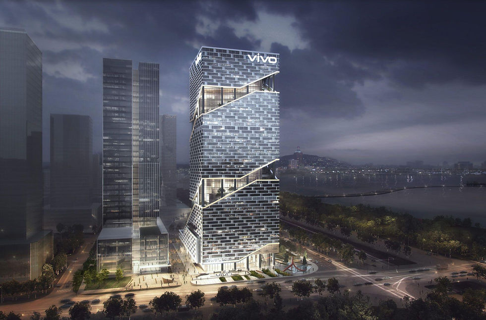 Dusk cityscape with a lit modern Vivo tower beside the waterfront, surrounded by glass skyscrapers and glowing roads.