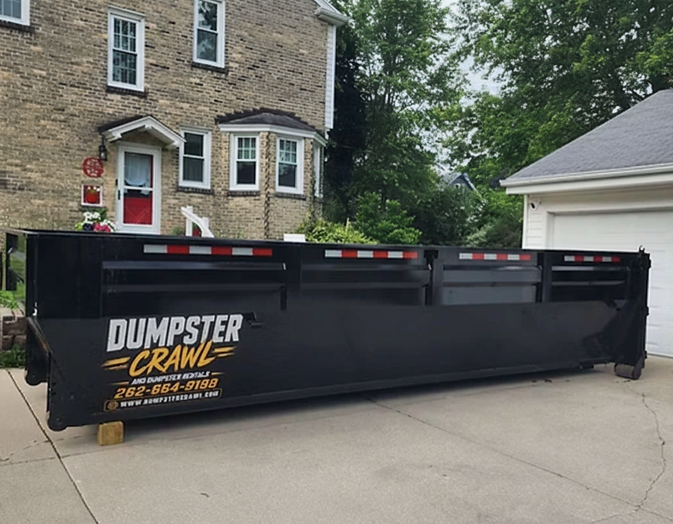 Dumpster Crawl rental in a Racine WI driveway