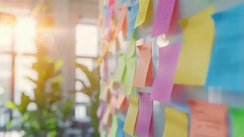 colorful-post-notes-wall-bright-office-team-collaboration-brainstorming-323111821.webp