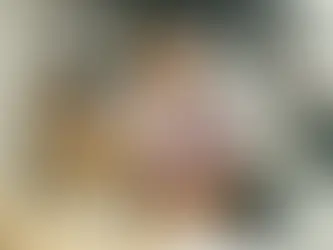 A woman attending a lead through headphones connected to laptop