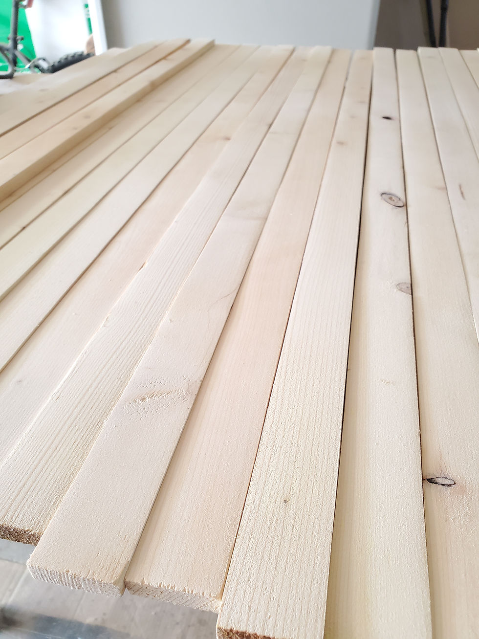 A close up image of the sticks freshly sanded smooth