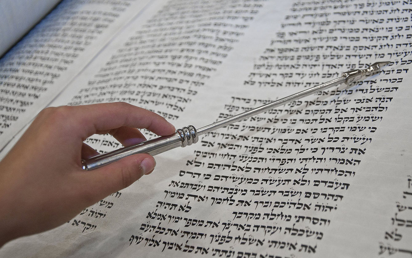 hand-reading-torah.jpg