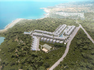 Dolce Mare by Köken Design Studio is a coastal residential development in Famagusta, Cyprus, featuring pools and terraces that foster community living. The design integrates water elements to connect residents and enhance the sense of community