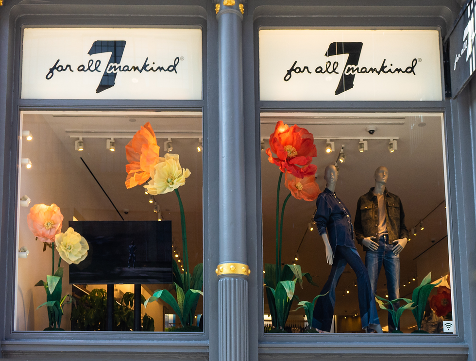 Eye-level view of a beautifully arranged floral photo backdrop made of paper flowers