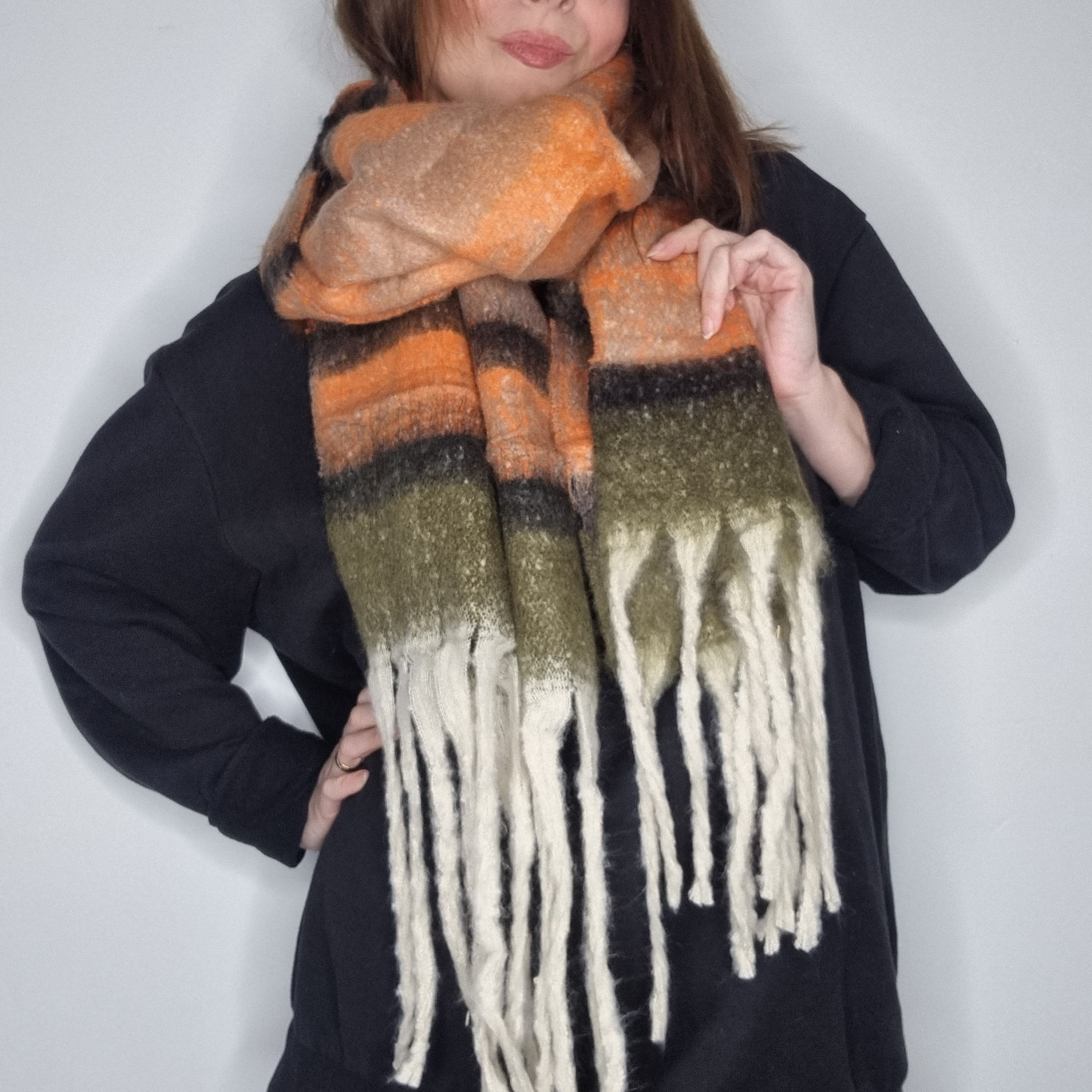 Soft, chunky, cashmere blend tassel scarf in orange, olive green and black