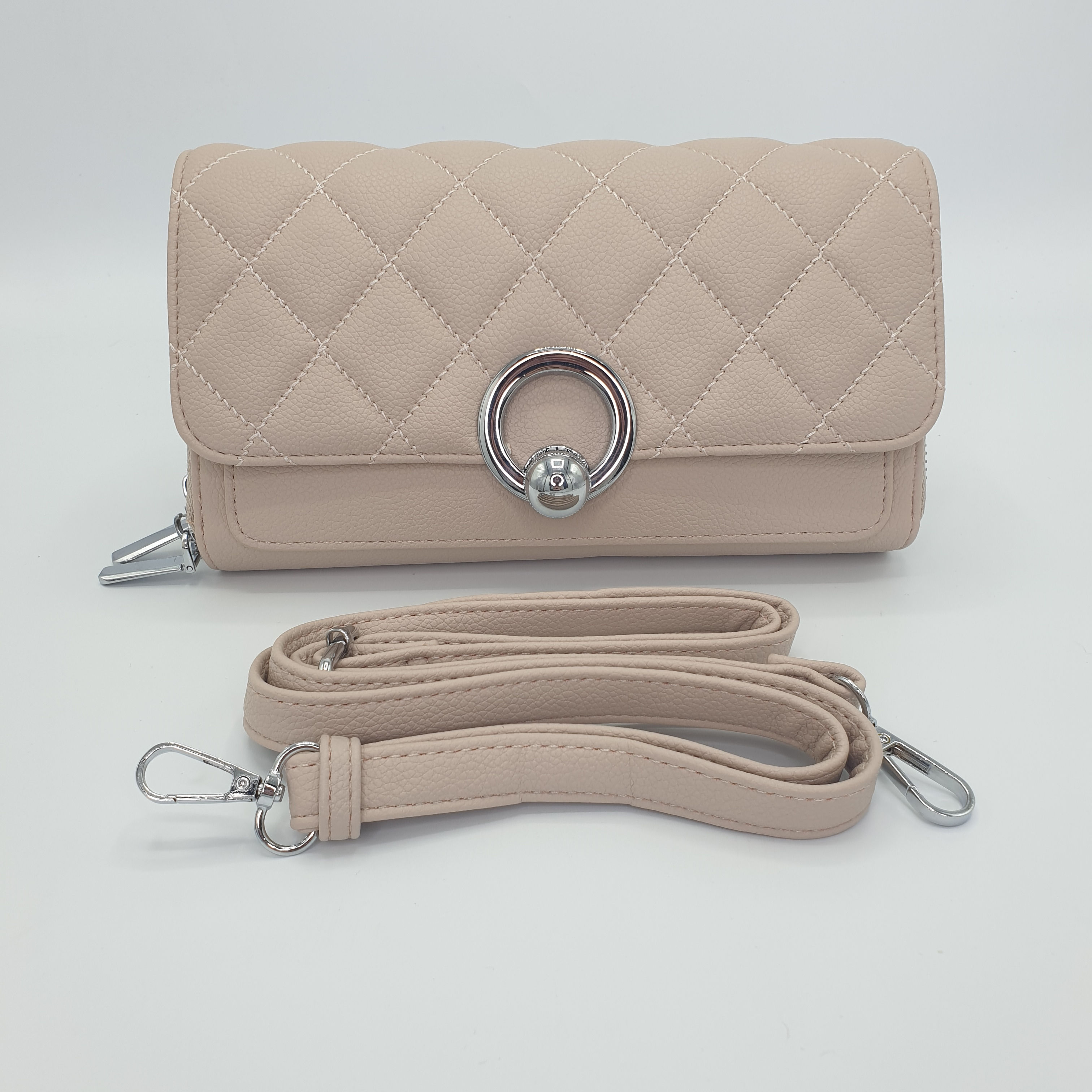 The Coco beige quilted cross body bag with detachable strap