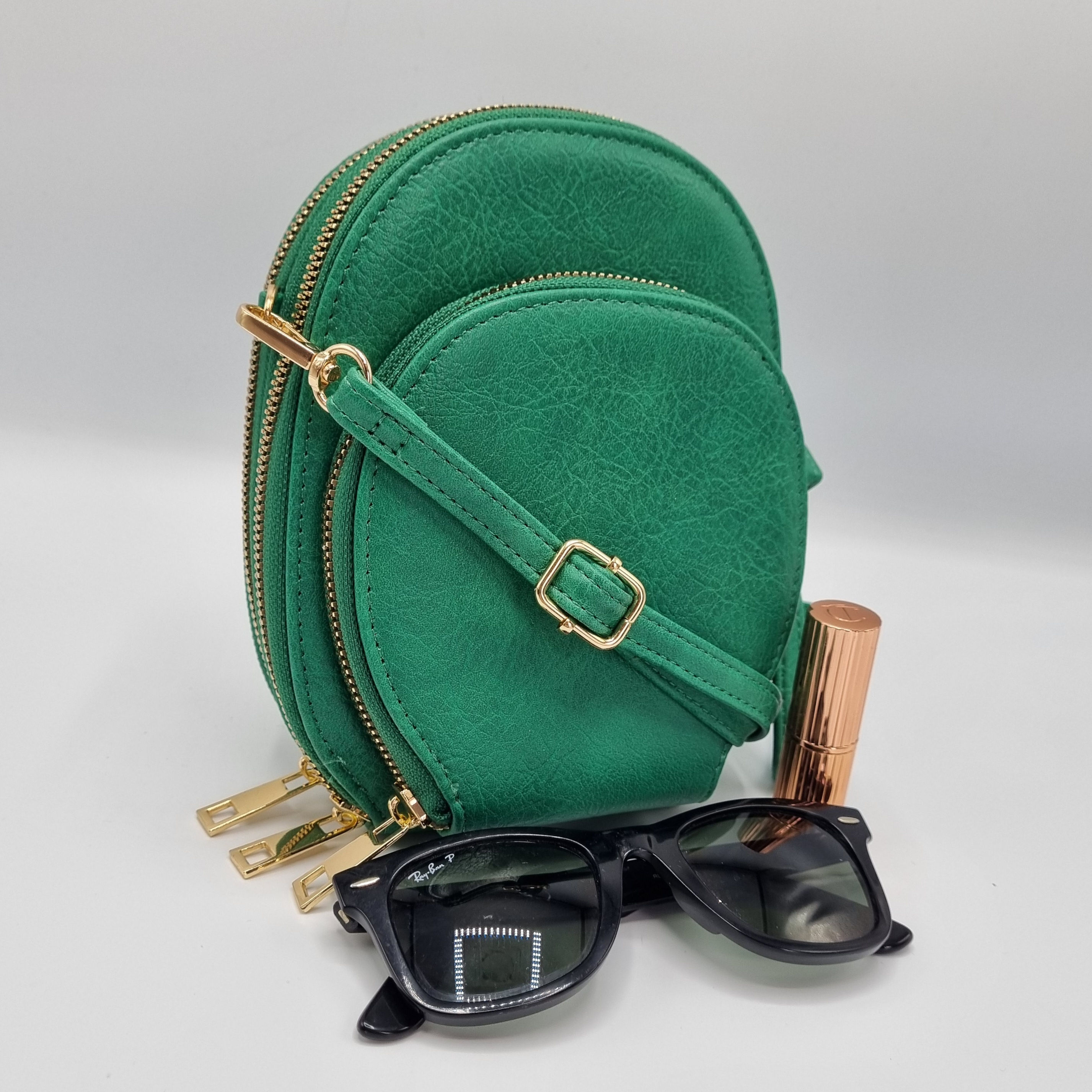 Green cross body phone bag with detachable strap