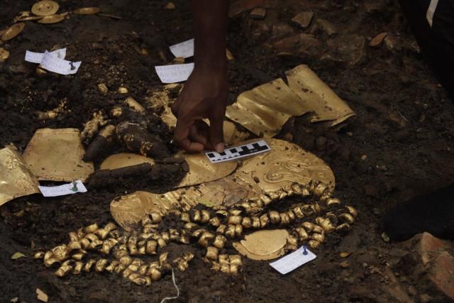 Archaeologists chanced upon an ancient tomb containing gold