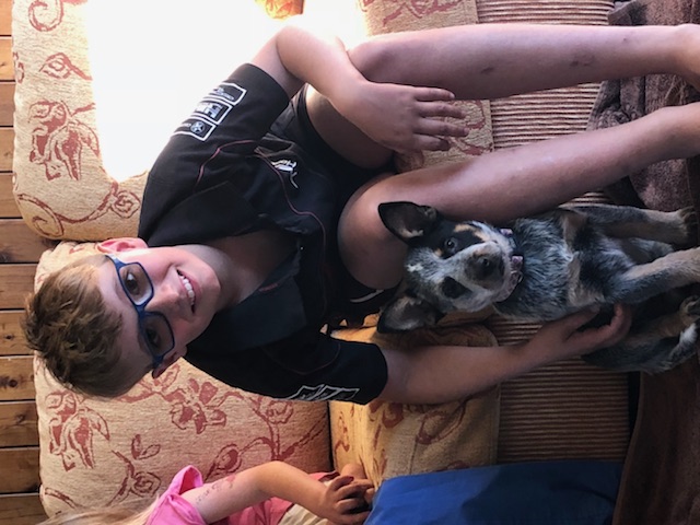 A boy and his TR pup