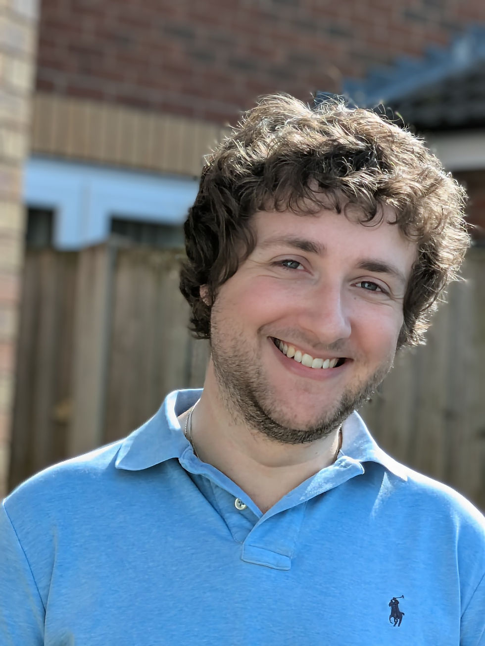 A head shot of the counsellor smiling and looking at the camera