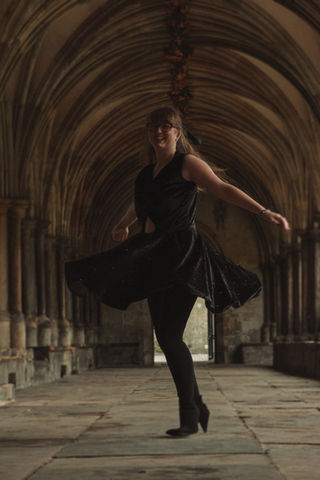 Lucy twirling in the dress (Front)