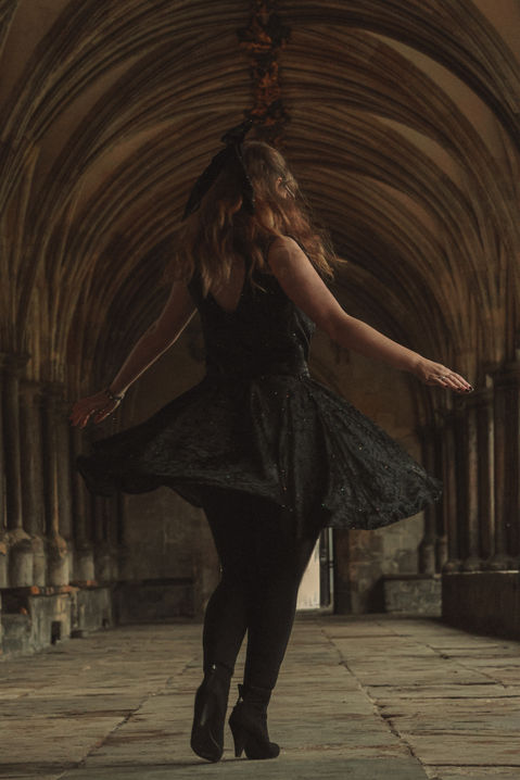 Lucy twirling in the dress (Back)
