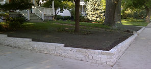 flagstone retaining wall concrete patio seating wall landscaping hydroseeding