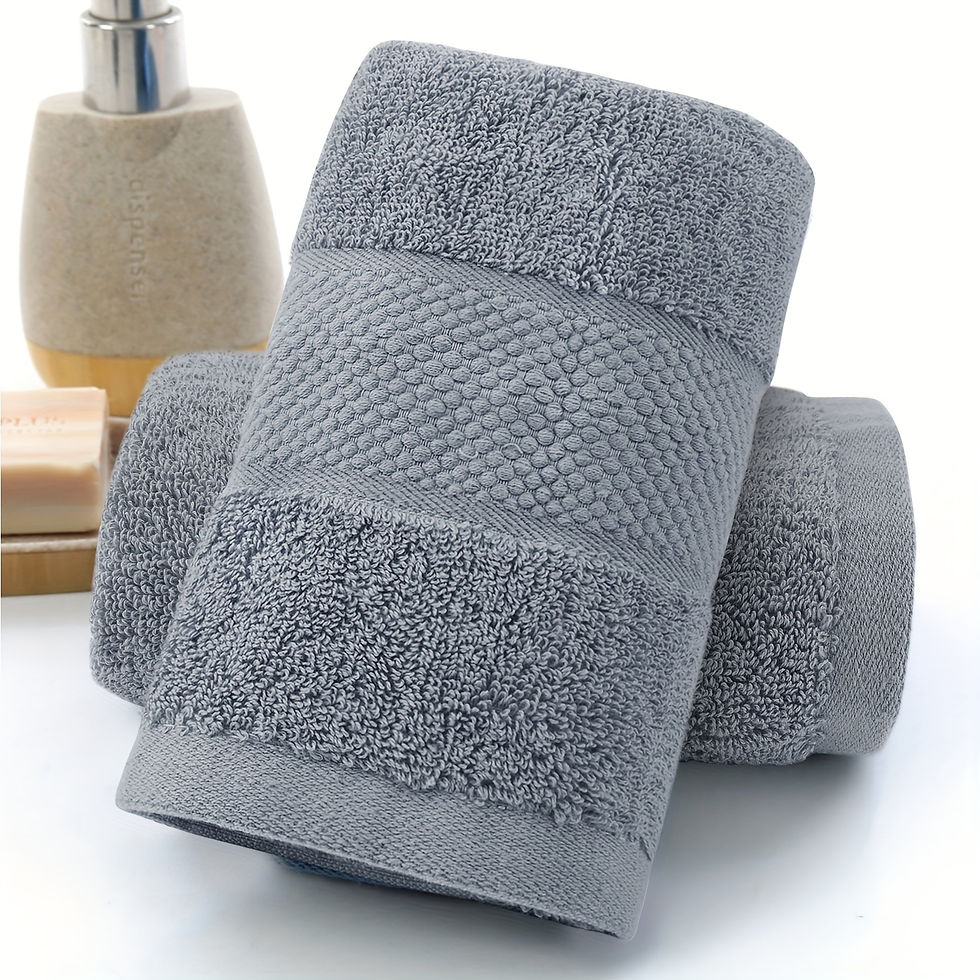 Thumbnail: 2 folded Grey cotton towel bathroom accessories in background