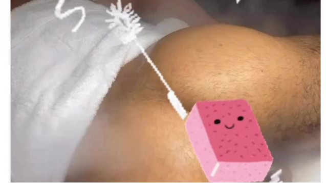 "Therapist applying exfoliating scrub on male client’s buttocks before steam treatment."