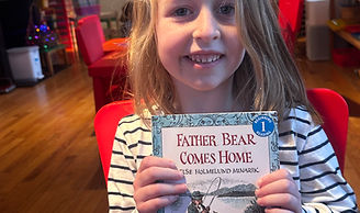 Young girl reading a book