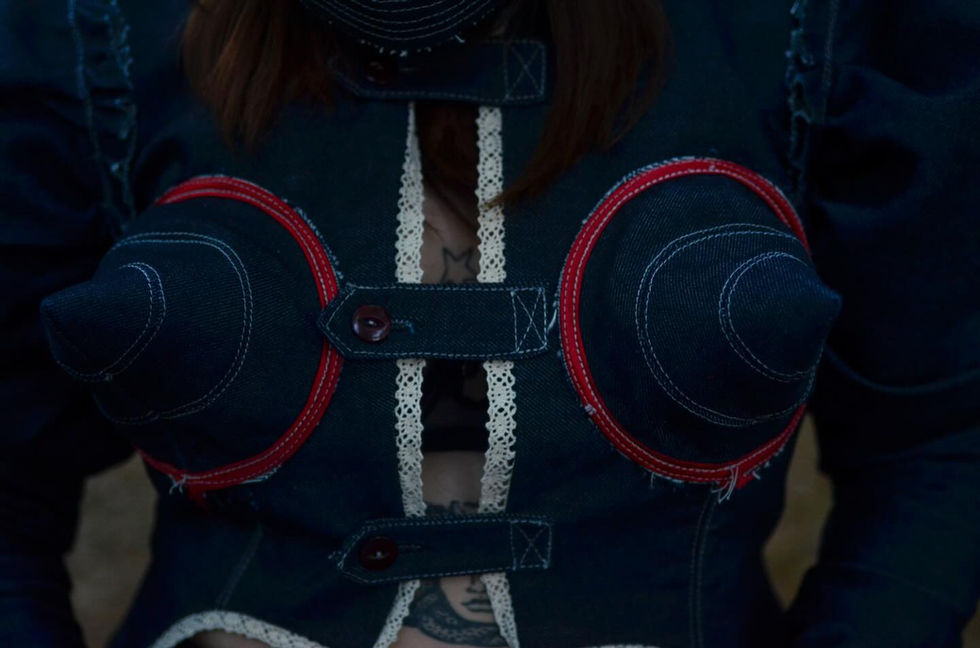 Avant-garde denim top with conical breast cups