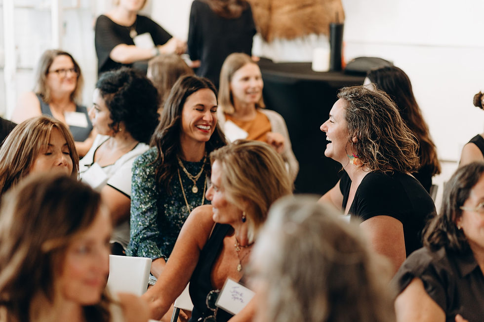 women laughing at an event at ALTAR Community