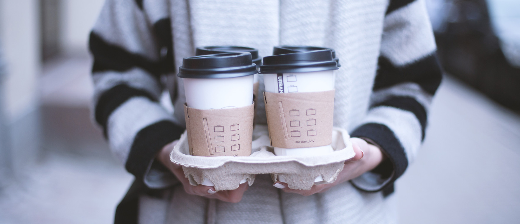 Girl Holding Take-Away Café