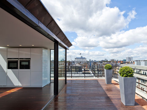 A deep, low-carbon, retrofit of an office building to create six luxury apartments with views across the Harley Street Conservation Area