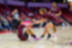 Alice Curman helps up Tkiyah Nelson