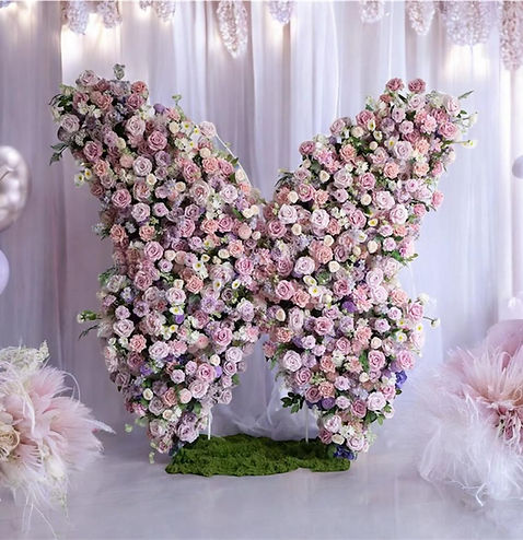 Our stunning butterfly flower backdrop available for weddings, birthdays and baby showers