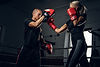sportive-blond-woman-has-boxing-training-with-her-experienced-trainer.jpg