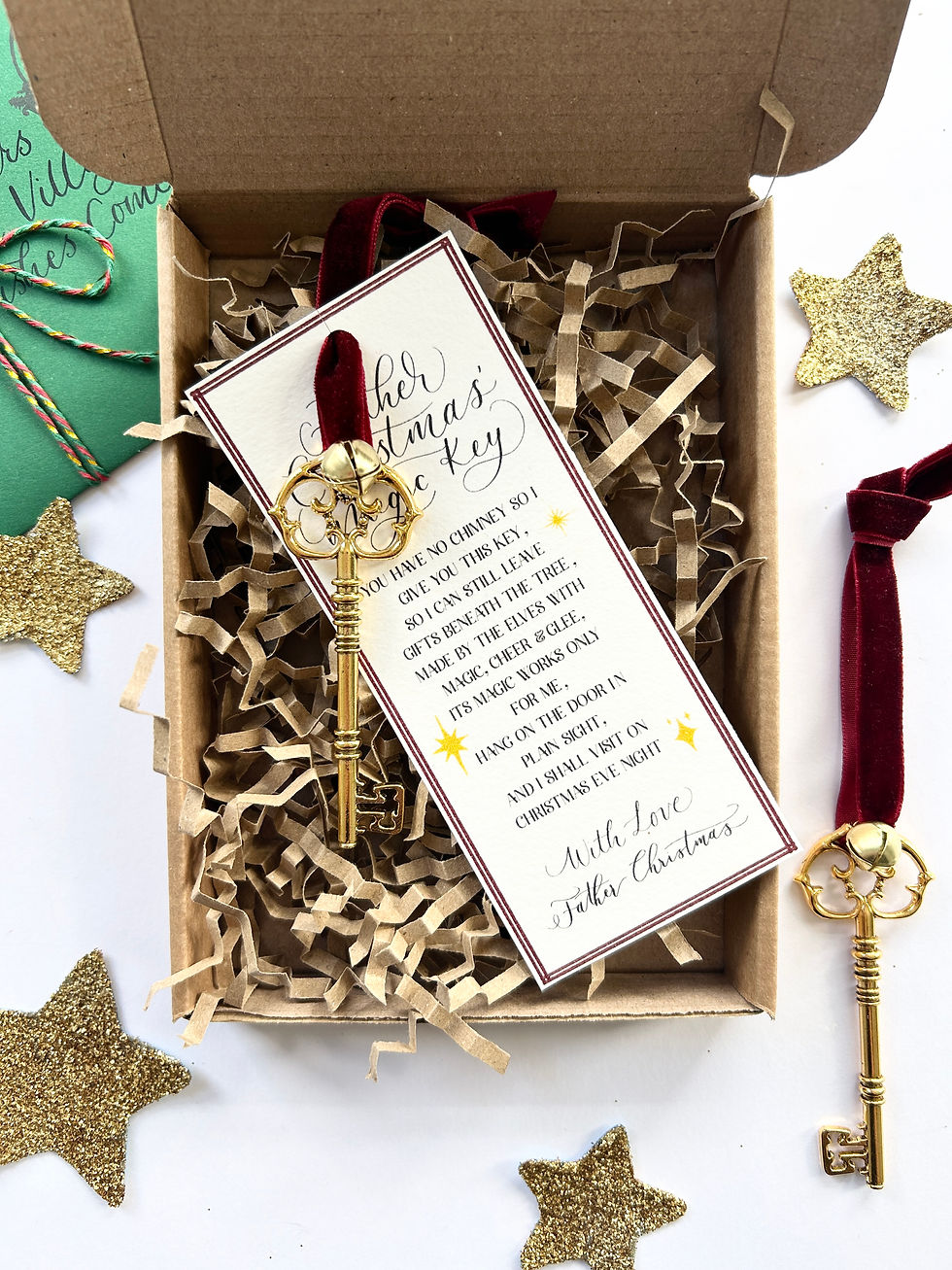Thumbnail: Golden Father Christmas/Santa Key with Bell and Red Velvet Ribbon with Poem Tag in Sustainable Packaging