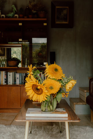 Sunflowers on cabin table