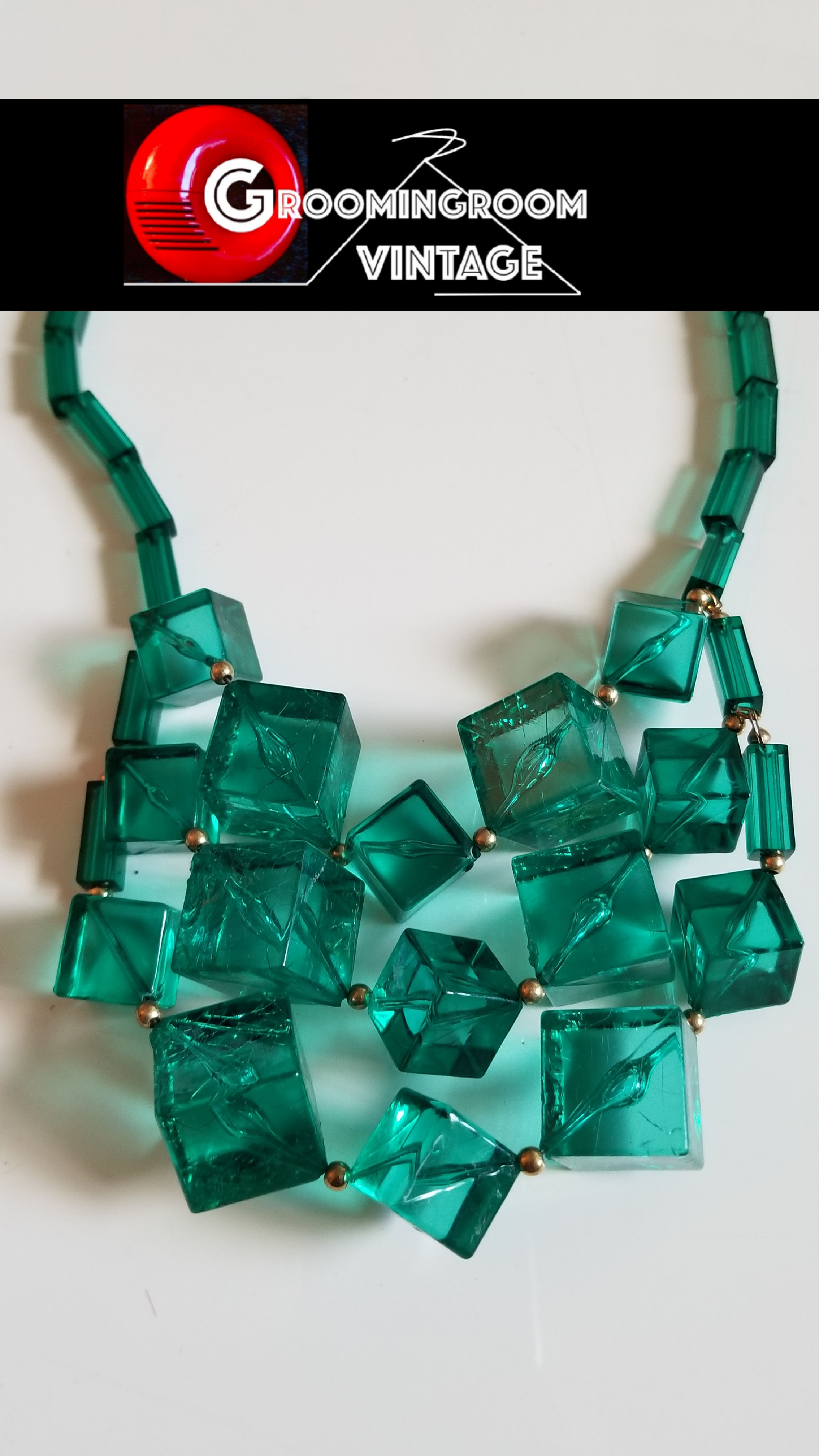 Green ice cube necklace made out of lucite.