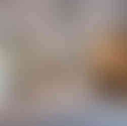 Family enjoying a warm and stylish carpeted basement space.