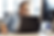 smiling-man-on-headset-working in call centre
