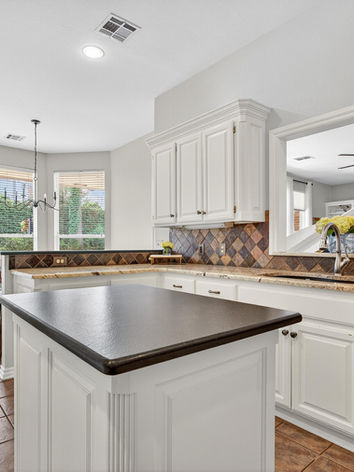kitchen with island and big windows