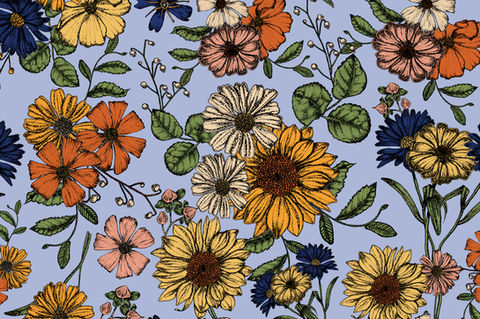 A vibrant floral pattern featuring yellow sunflowers, blue daisies, orange poppies, and pink blooms, with green leaves, set against a soft blue background. This intricate and colorful design is ideal for fabric, wallpaper, or decorative art projects.