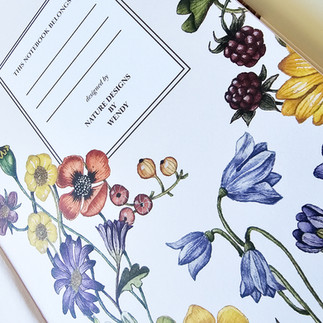 Luxury hardcover floral notebook showcasing a watercolour botanical illustration inspired by nature, gardens and wildflowers. The elegant notebook design features detailed flowers, leaves and botanical elements creating a calming and creative writing space. Perfect for journaling, planning goals, recording ideas and adding a touch of beauty to your workspace. Aesthetic stationery for intentional living and mindful creativity.